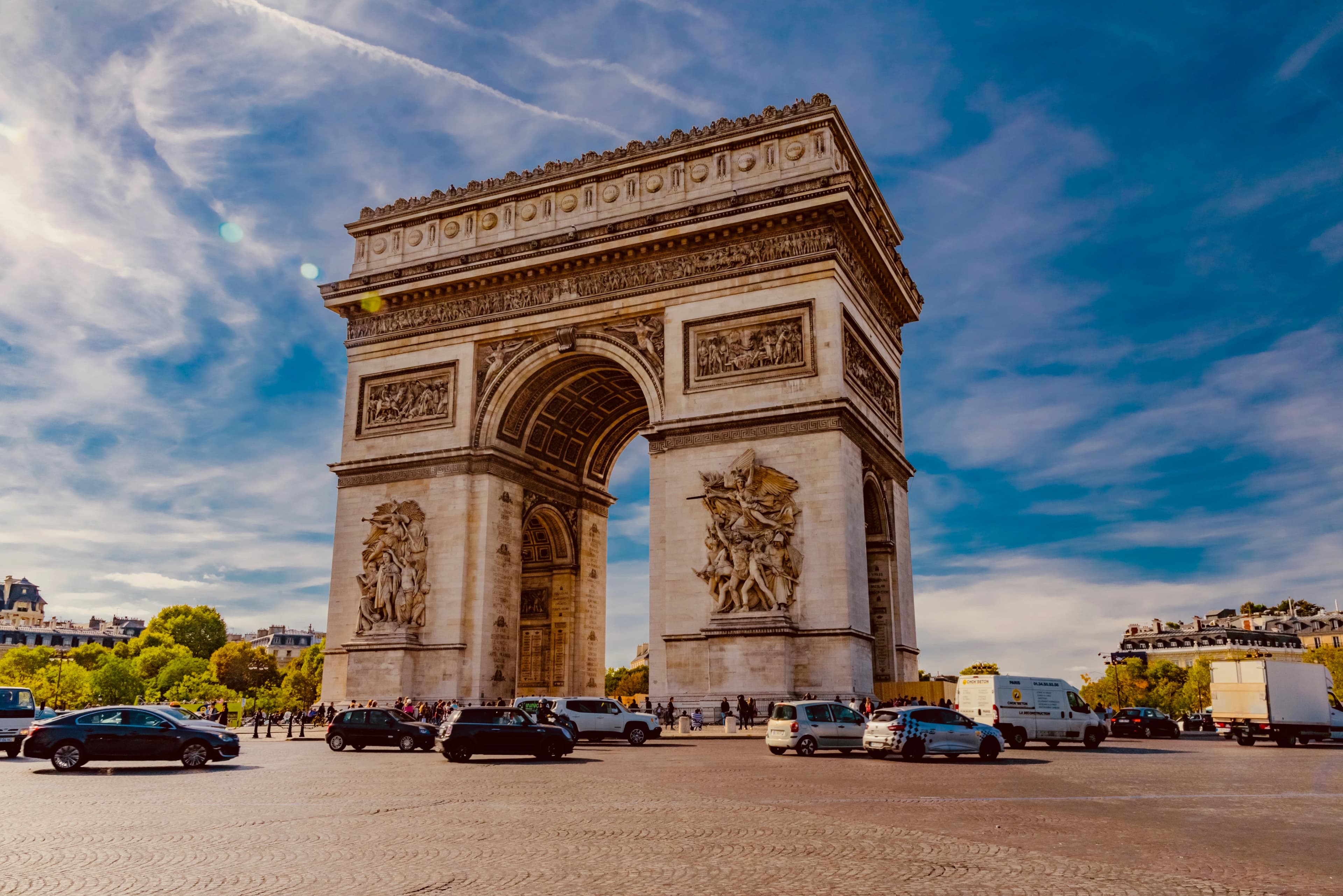 Paris reflected in water under a clear sky