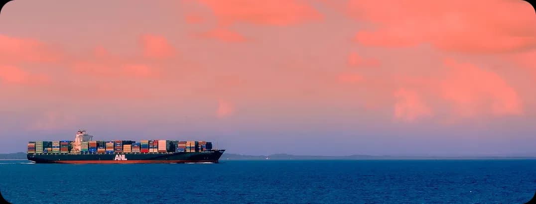 Cargo ship traveling across the sea